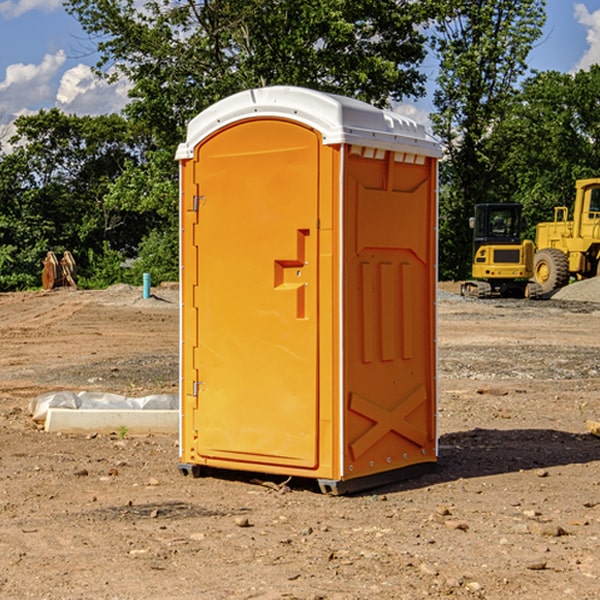 what is the cost difference between standard and deluxe portable restroom rentals in Hull IA